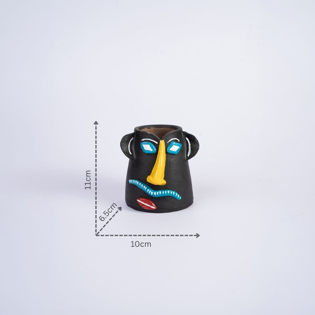 Terracotta Tribal Male Face Pen Stand (Black) with dm