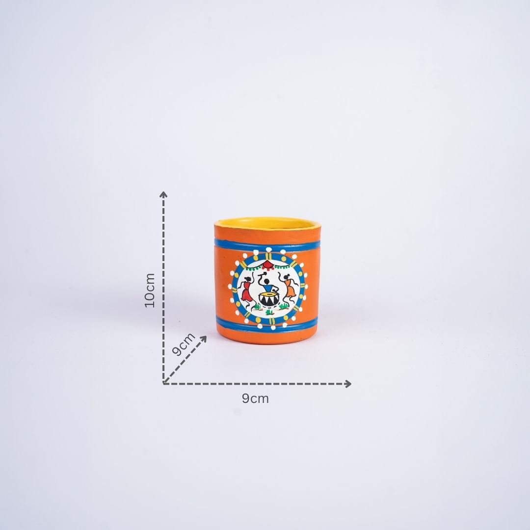 Terracotta Warli Art Hand Painted Cylinder Shaped Pen Stand (Orange) with dm